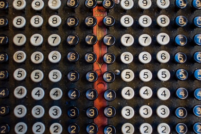 https://unsplash.com/photos/a-close-up-of-a-calculator-E-cBijEKww0?utm_content=creditShareLink&utm_medium=referral&utm_source=unsplash