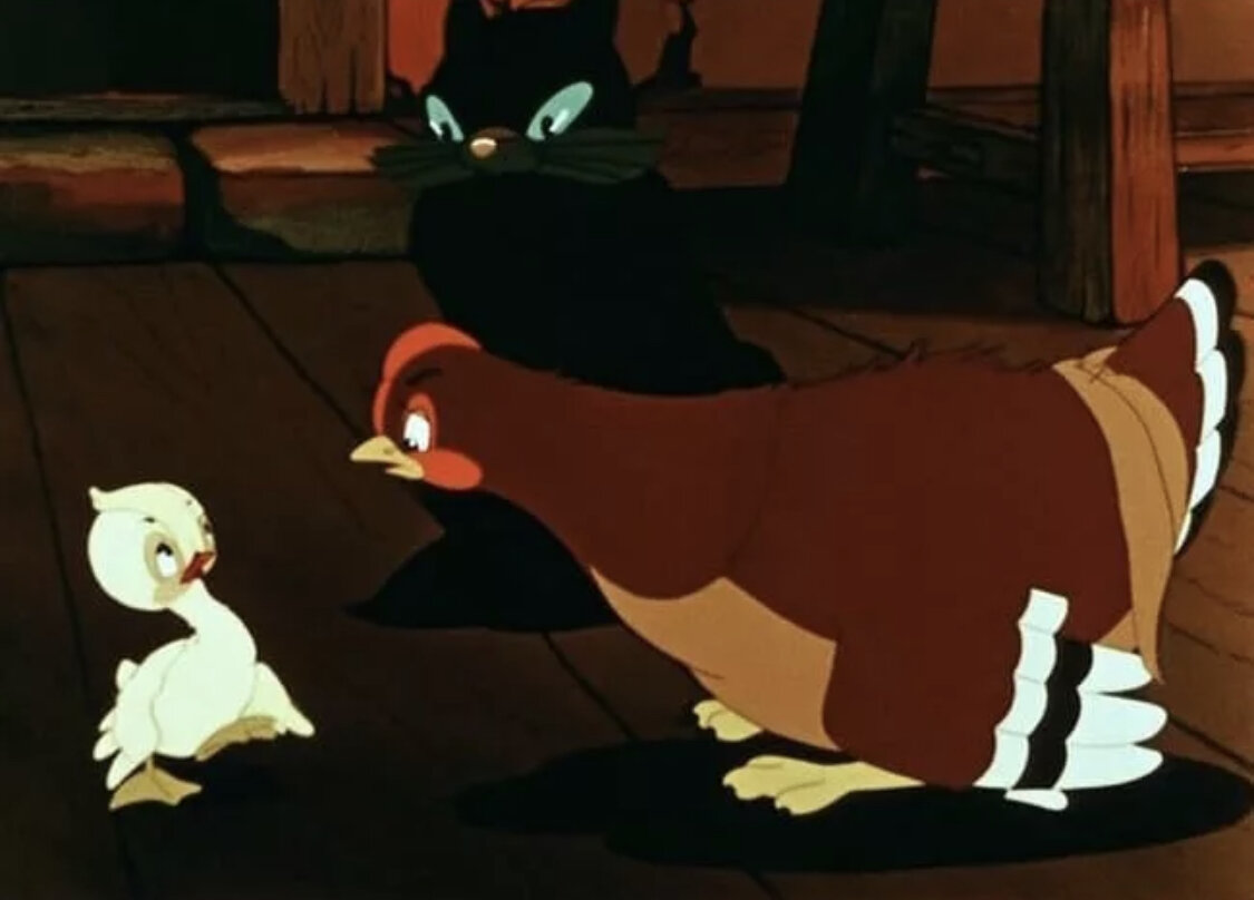 Кот и курица дают понять, что утенку рядом с ними не ужиться. Фото — стоп-кадр из м/ф «Гадкий утенок», 1955