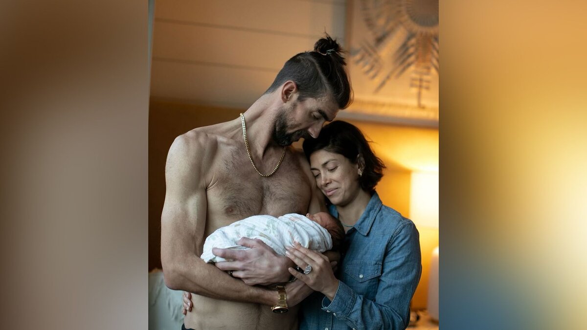  Майкл Фелпс с женой и новорожденным сыном