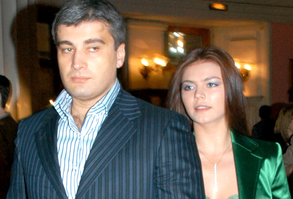 на фото Алина Кабаева и Давид Муселиани