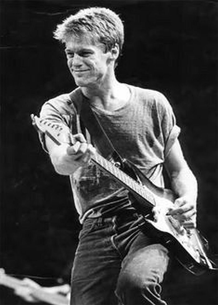 Брайан Адамс