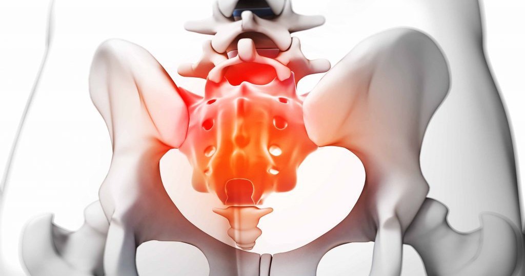 Боль в крестце. Почему возникает, и что делать?