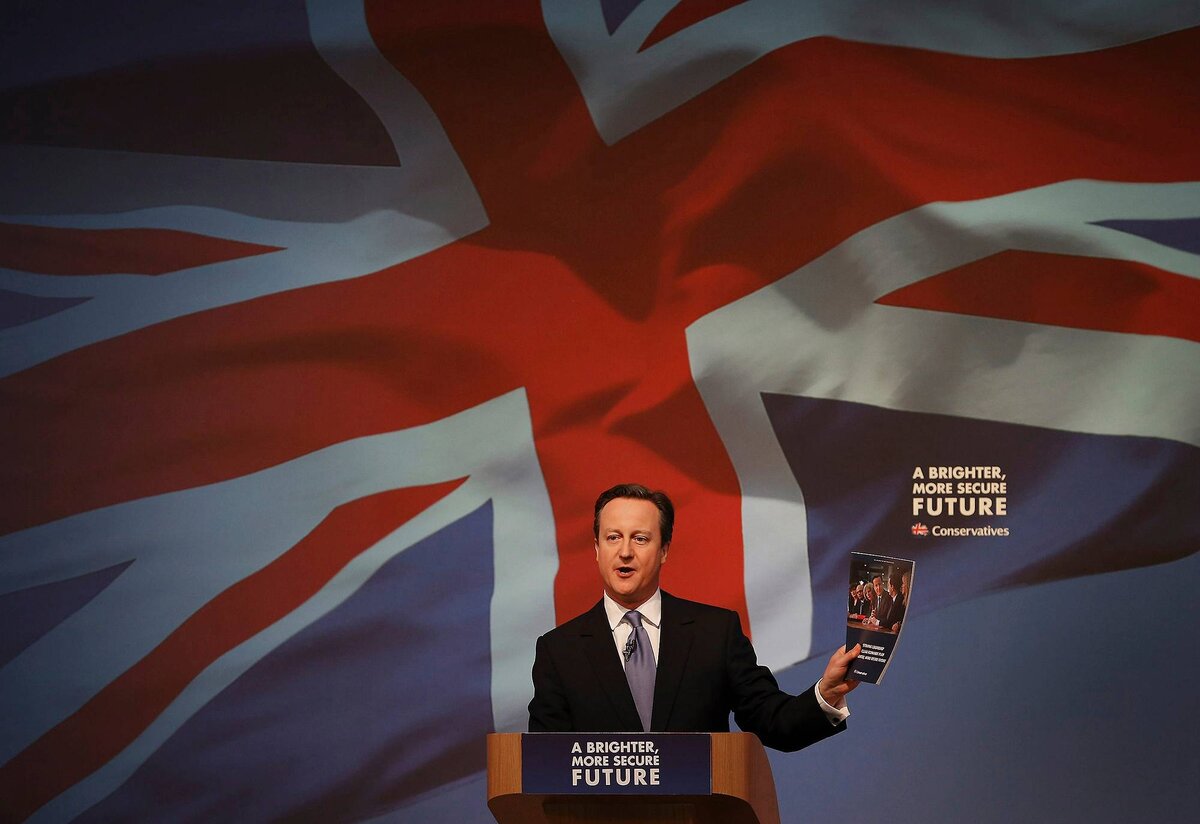    LON133; Britain's Prime Minister David Cameron gestures as he unveils the Conservative party manifesto, in Swindon, England, Tuesday April 14, 2015. Britain goes to the polls for a parliamentary election on Thursday May 7, 2015. (Peter Macdiarmid, Pool Photo via AP) AP / LEHTIKUVA pipiya