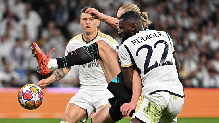    Тони Кроос, Эрлинг Холанн и Антонио Рюдигер. AFP