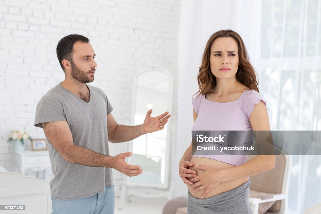 https://media.istockphoto.com/id/973271302/photo/sad-man-and-pregnant-woman-arguing.jpg?s=1024x1024&w=is&k=20&c=56p3XWxm7nUoXbWkQOKLfDfdBYQpOIWWYCZXyS1V1BI=