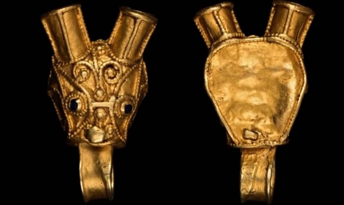 золотая статуэтка