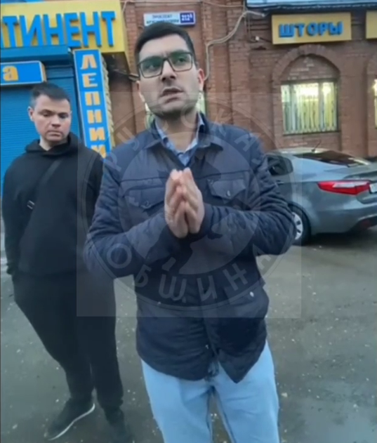 Мигрант извиняется на камеру. Фото: тг-канал "Русская община".