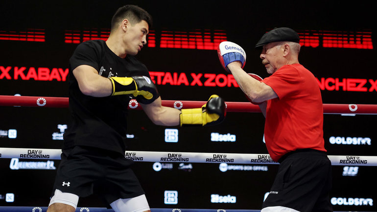    Дмитрий Бивол и Геннадий Машьянов. Getty Images