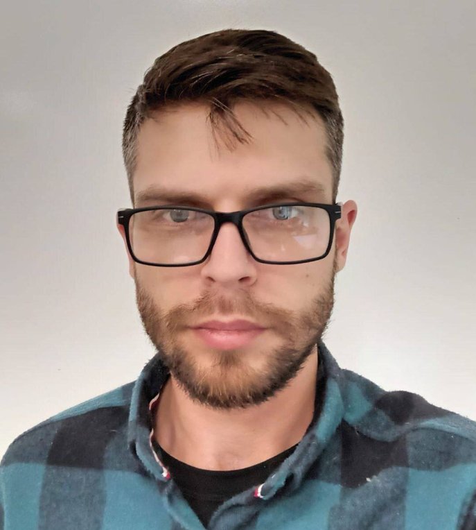 Учитель информатики Алексей Григорик.
