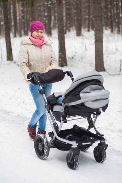 https://img.freepik.com/premium-photo/middle-eastern-woman-with-stroller-going-for-a-walk-in-a-park-during-lovely-winter-afternoon_152898-2043.jpg?size=626&ext=jpg