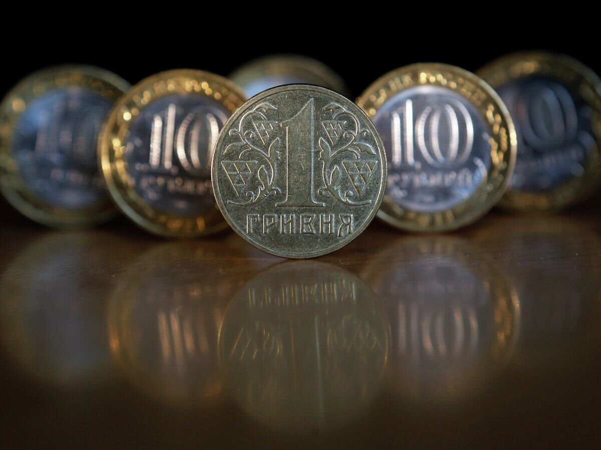   Денежные купюры и монеты России и Украины© РИА Новости / Александр Демьянчук