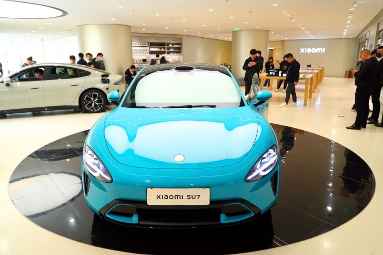 Потребители увидят новый SU7 от Xiaomi во флагманском магазине Xiaomi Electric Vehicle 2 апреля 2024 года во Пекине