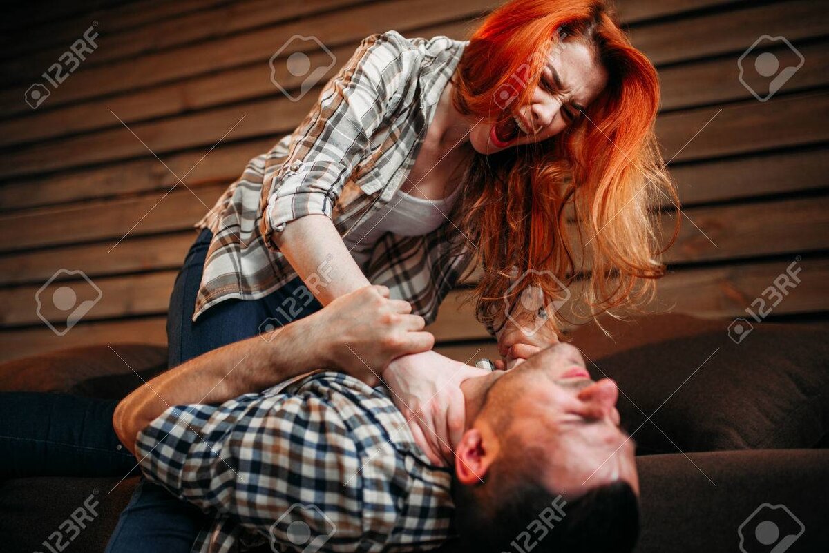 https://ru.123rf.com/photo_84210393_wife-strangles-her-husband,-quarrel,-conflict.html