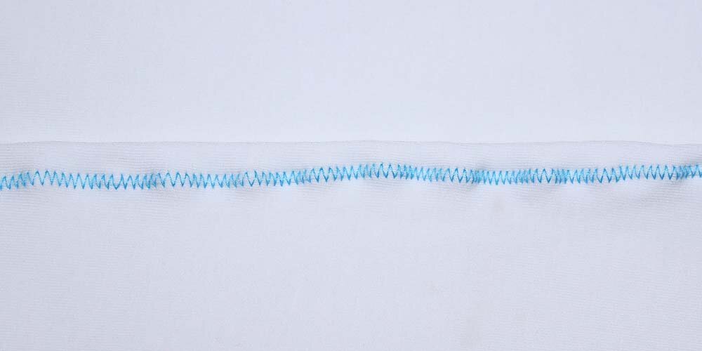 loose, stretched edge of the material
