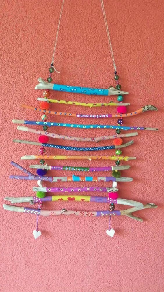 Декор на стену и использованием палочек и бусин