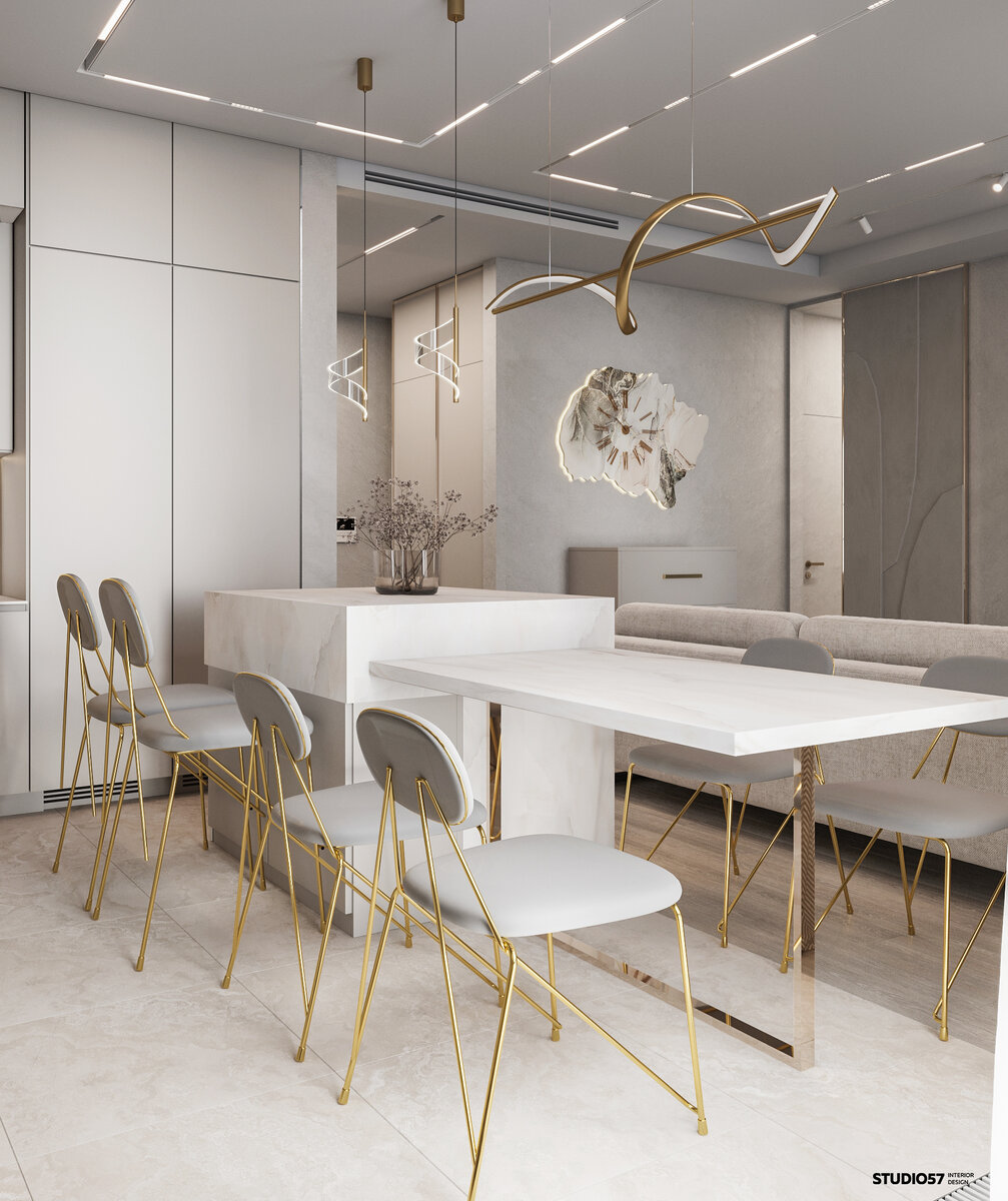 Внимание здесь притягивает напольное покрытие, которое играет равнозначную роль зонирования двух помещений, как и сам кухонный остров