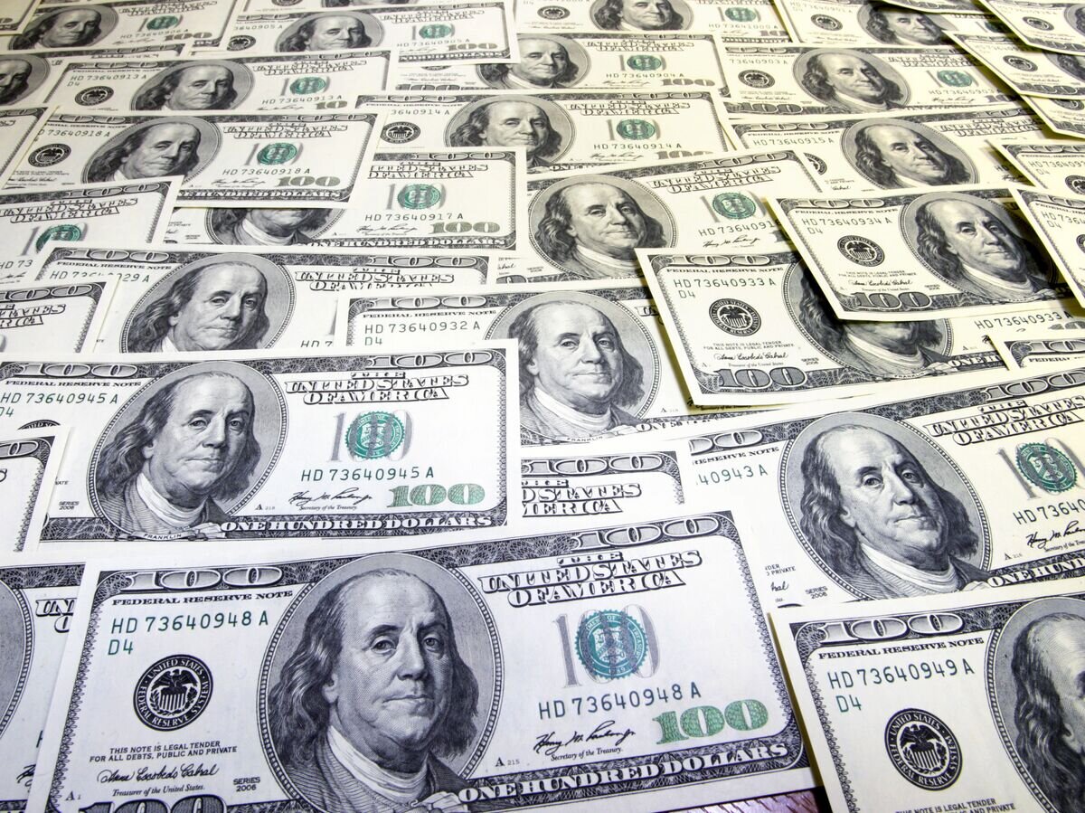     доллары США© РИА Новости . Михаил Кутузов