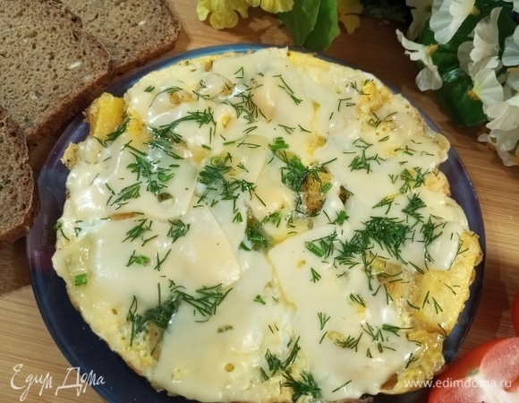 Кабачки с яйцами и сыром