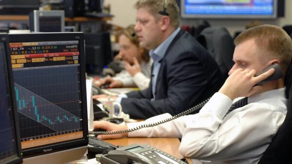 Юристы рассказали, как оплатят работу в майские праздники. Обложка © ТАСС / Станислав Красильников