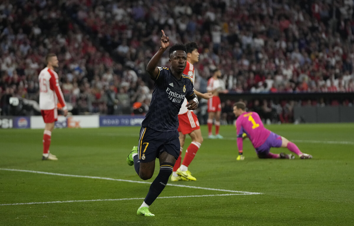    Нападающий "Реала" Винисиус  AP/Matthias Schrader