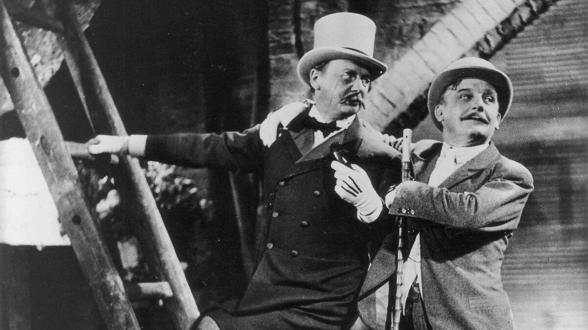 Актер Рудольф Форстер и актер Райнхольд Шюнцель в фильме Георга Вильгельма Пабста «Трёхгрошовая опера» (Die Dreigroschenoper)