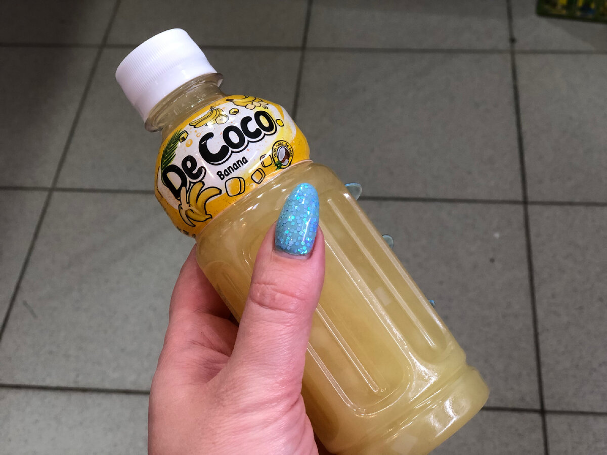 Напиток безалкогольный негазированный пастеризованный сокосодержащий с кусочками кокосового желе "Ната де коко" со вкусом банана "De coco" 