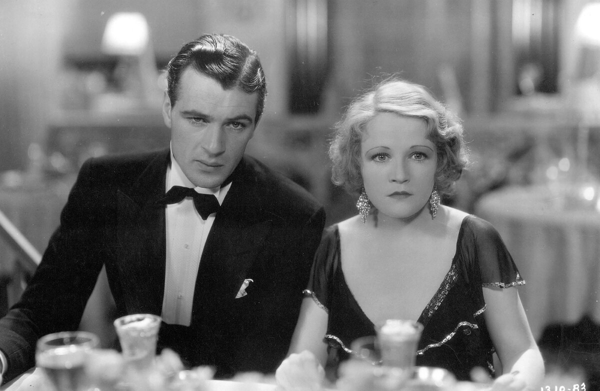 Актер Гэри Купер и актриса Винн Гибсон в фильме Рубена Мамуляна «Городские улицы» (City Streets)