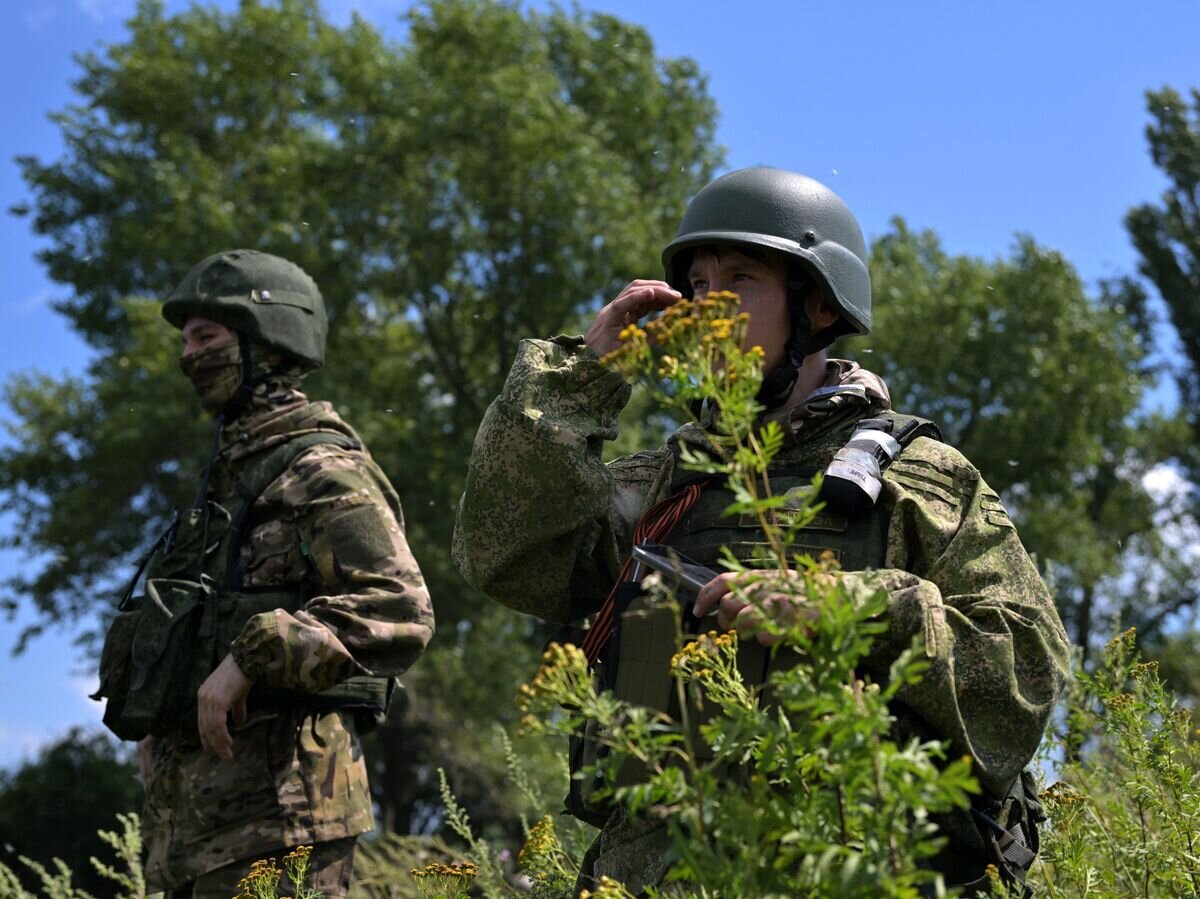    Военнослужащие ВС РФ на огневой позиции© РИА Новости . Евгений Биятов