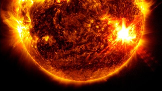     Солнечная вспышка X5.8, зафиксированная 10 мая.    
 Источник: NASA / SDO