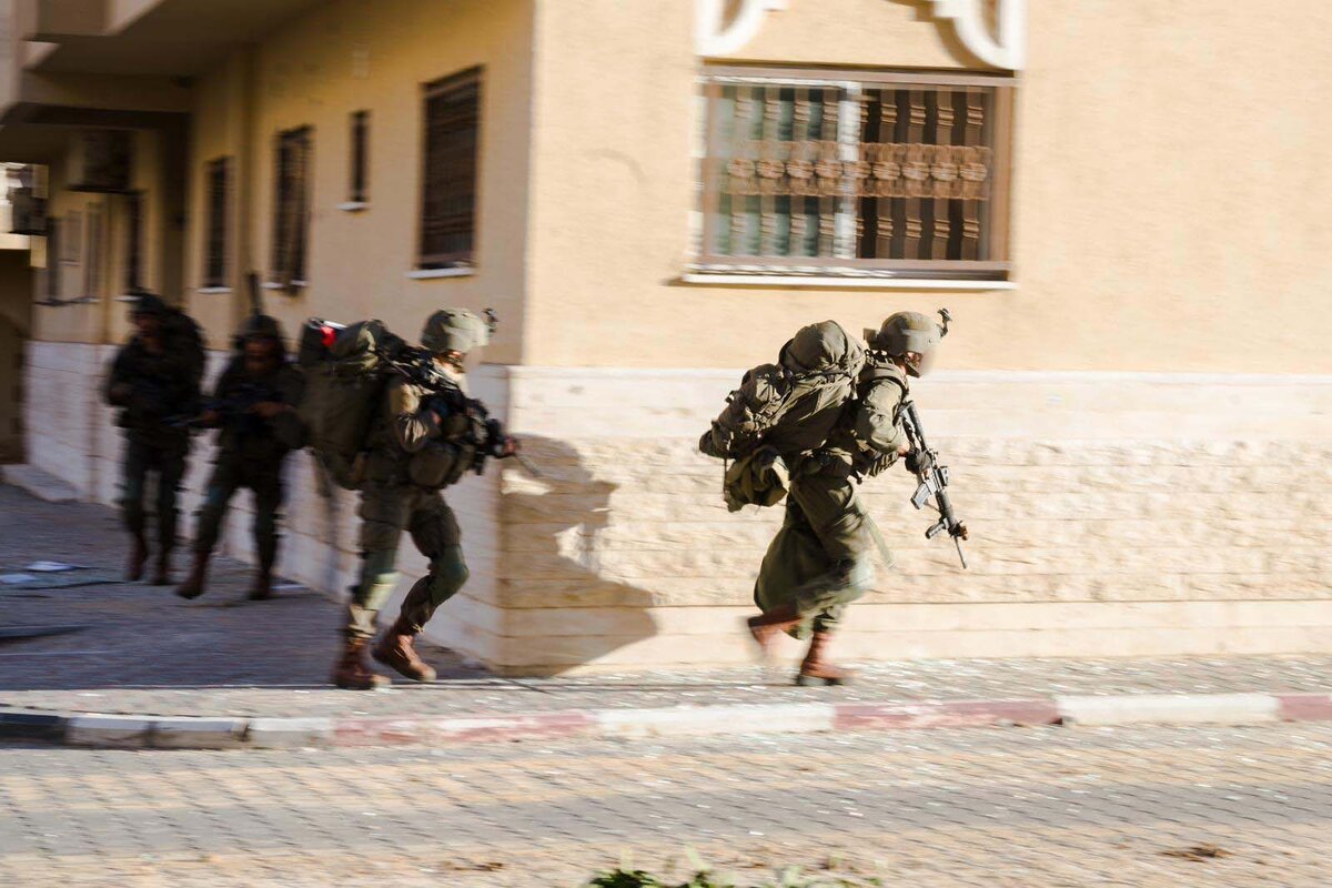 Troops of the Commando Brigade operate at the Hamad Town residential complex in southern Gaza's Khan Younis, in a handout image published March 25, 2024. (Israel Defense Forces)