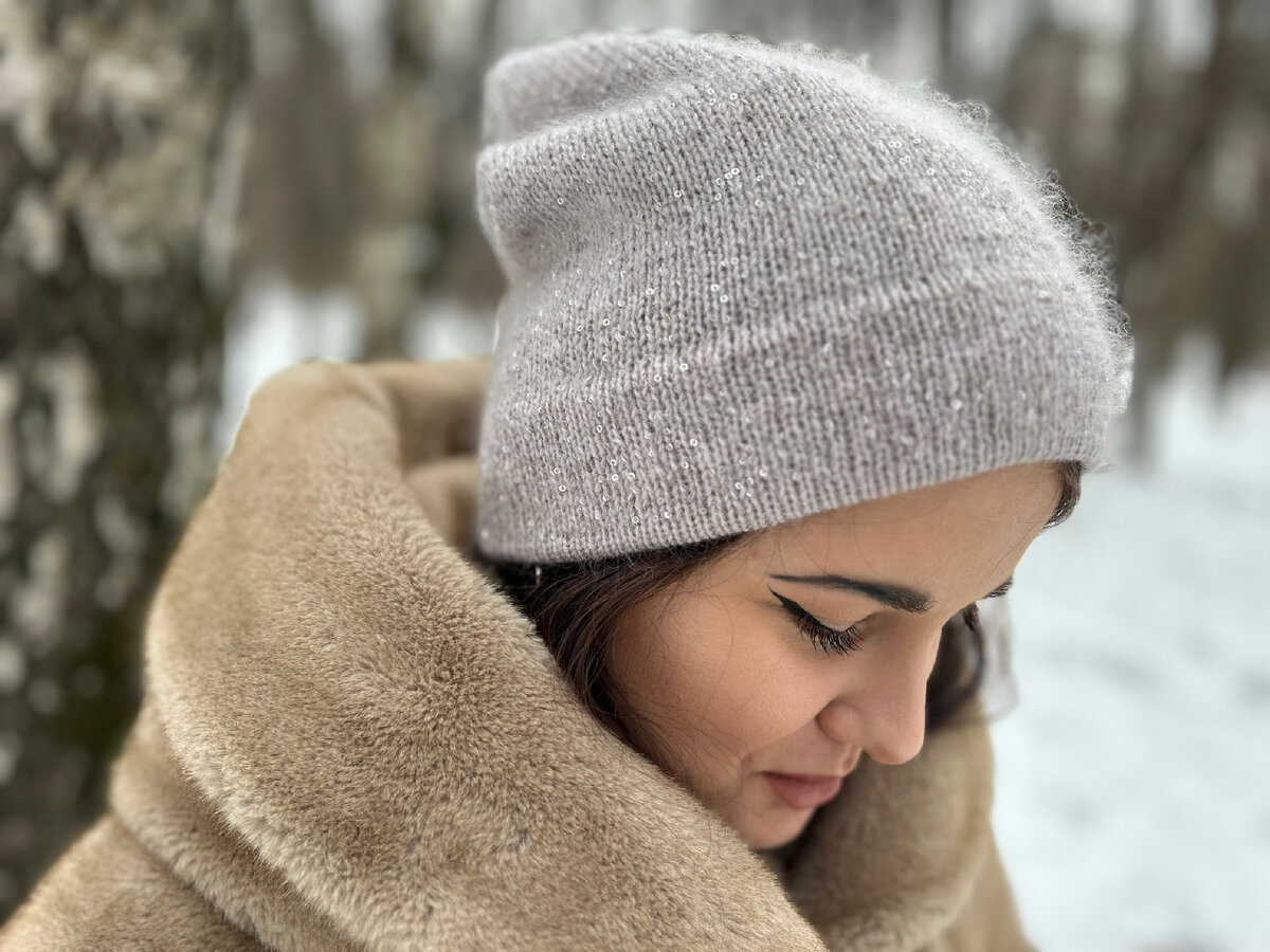 Вы этот пушок видите? За два года шапка еще больше распушилась.