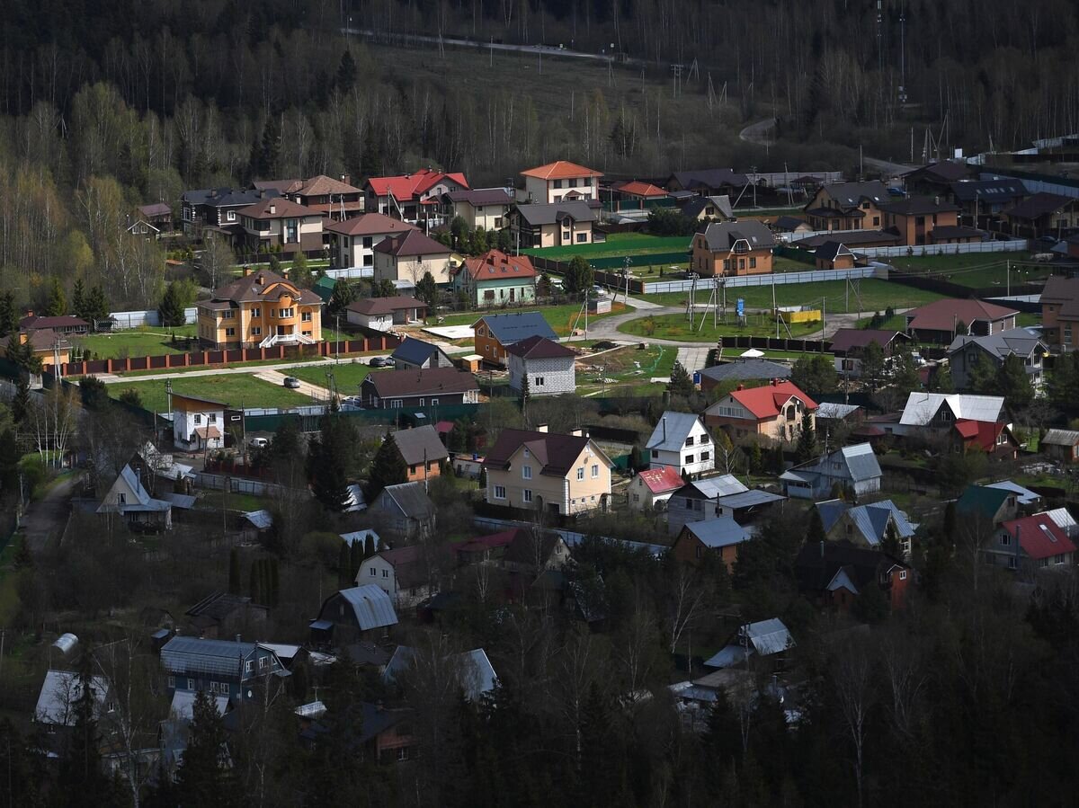    Коттеджный поселок в Московской области© РИА Новости / Павел Бедняков