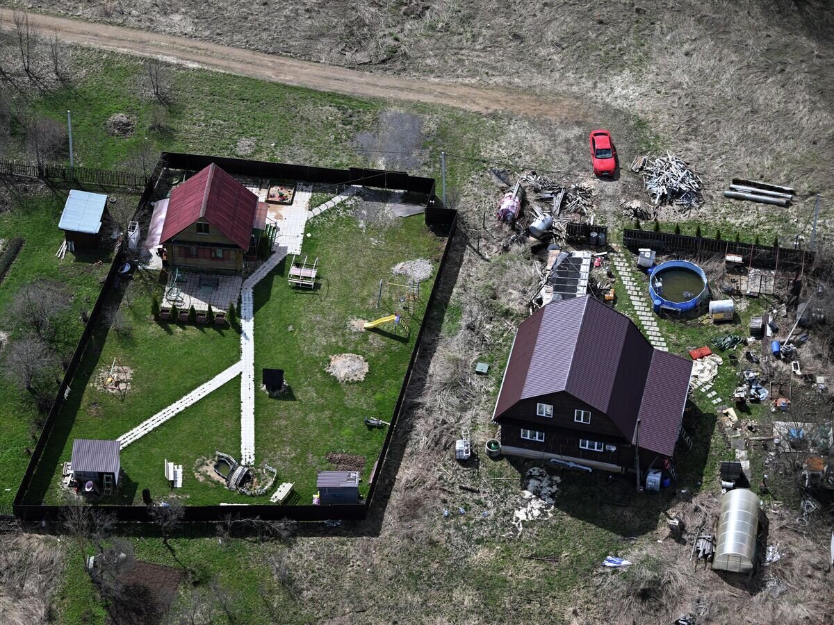    Дома в Московской области© РИА Новости / Павел Бедняков