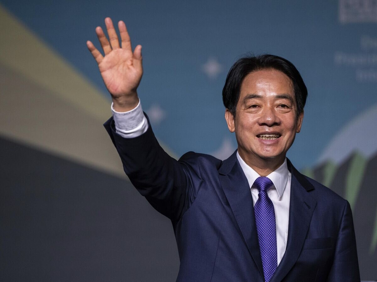    Лай Циндэ© AP Photo / Louise Delmotte