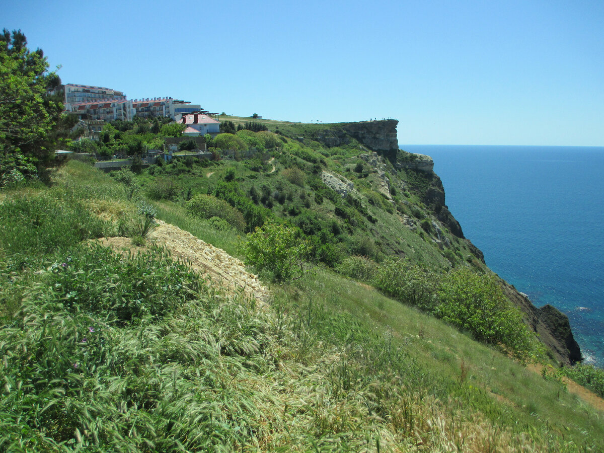 Мыс вон там