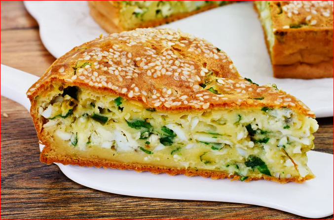 Потрясающе вкусный пирог с луком и яйцом. Тесто делается заливное на сметане. Быстро и просто
