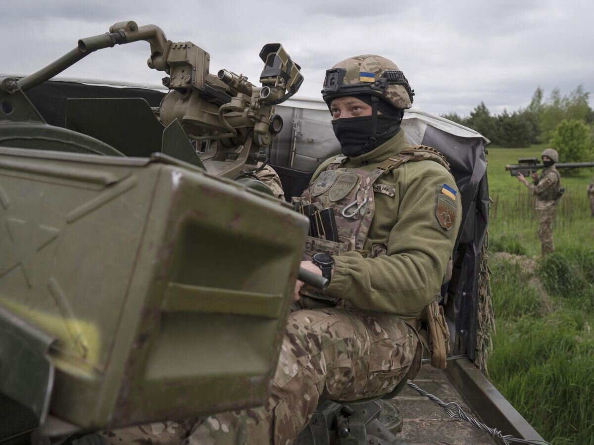    Украинские военнослужащие© AP Photo / Andrew Kravchenko