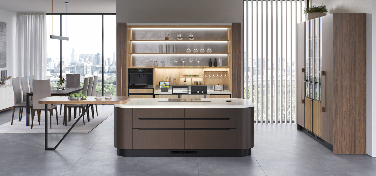 На этот раз дизайнеры скомбинировали фасады 2х видов шпона: Орех Тоскана и Дуб Vintage Amber, прозрачное стекло, нержавеющую сталь и полюбившуюся клиентами эмаль под состаренную бронзу.