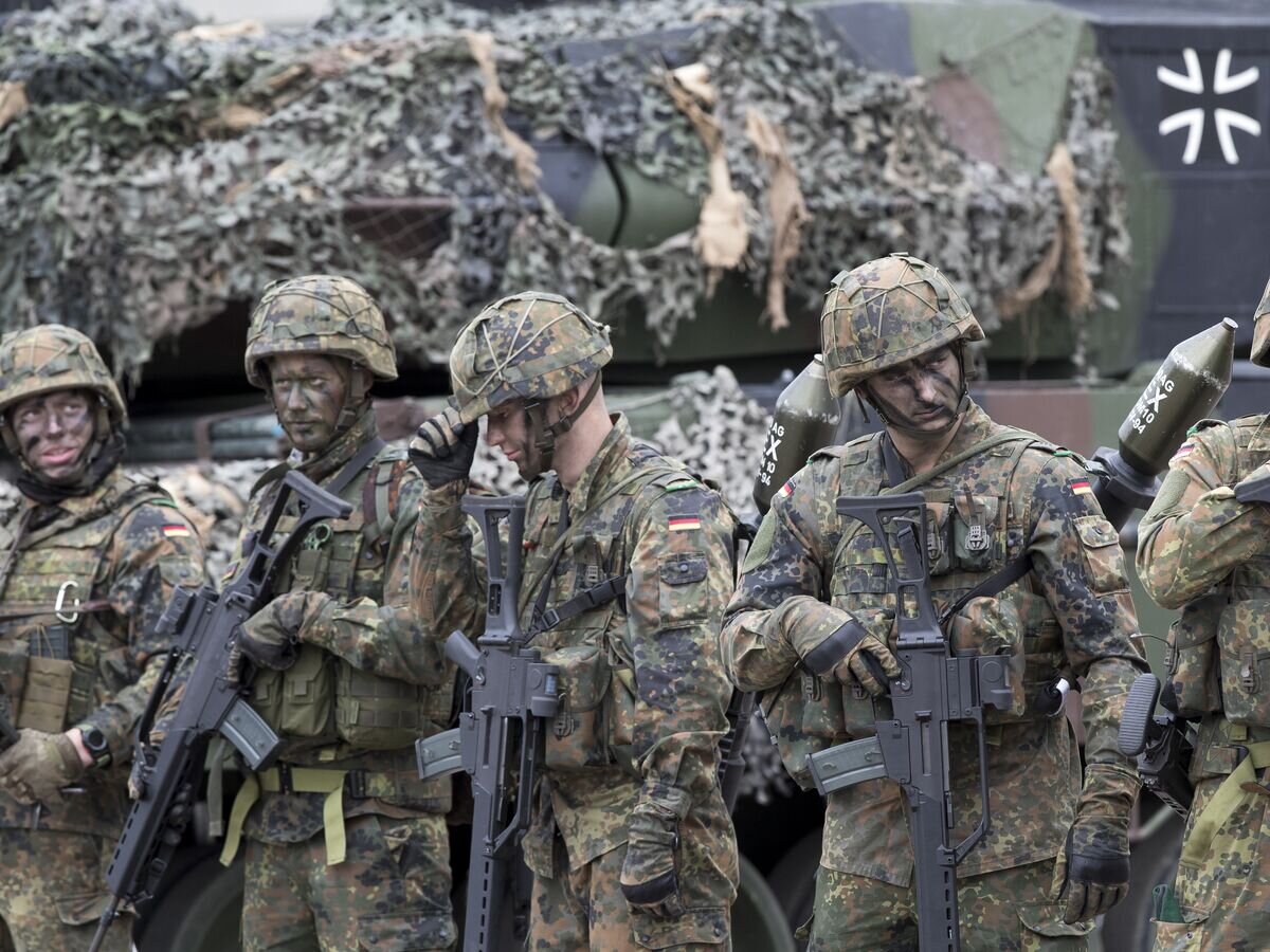    Немецкие солдаты бундесвера © AP Photo / Mindaugas Kulbis