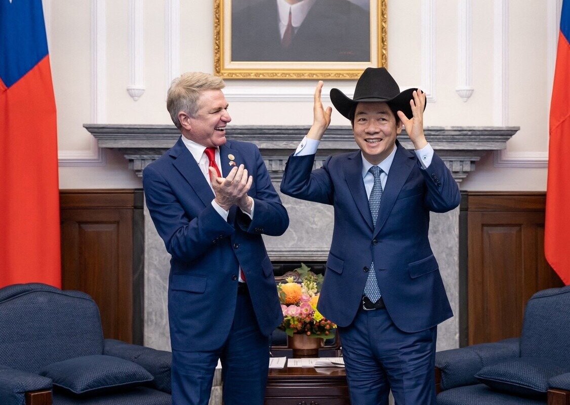 Майкл Маккол и Лай Циндэ