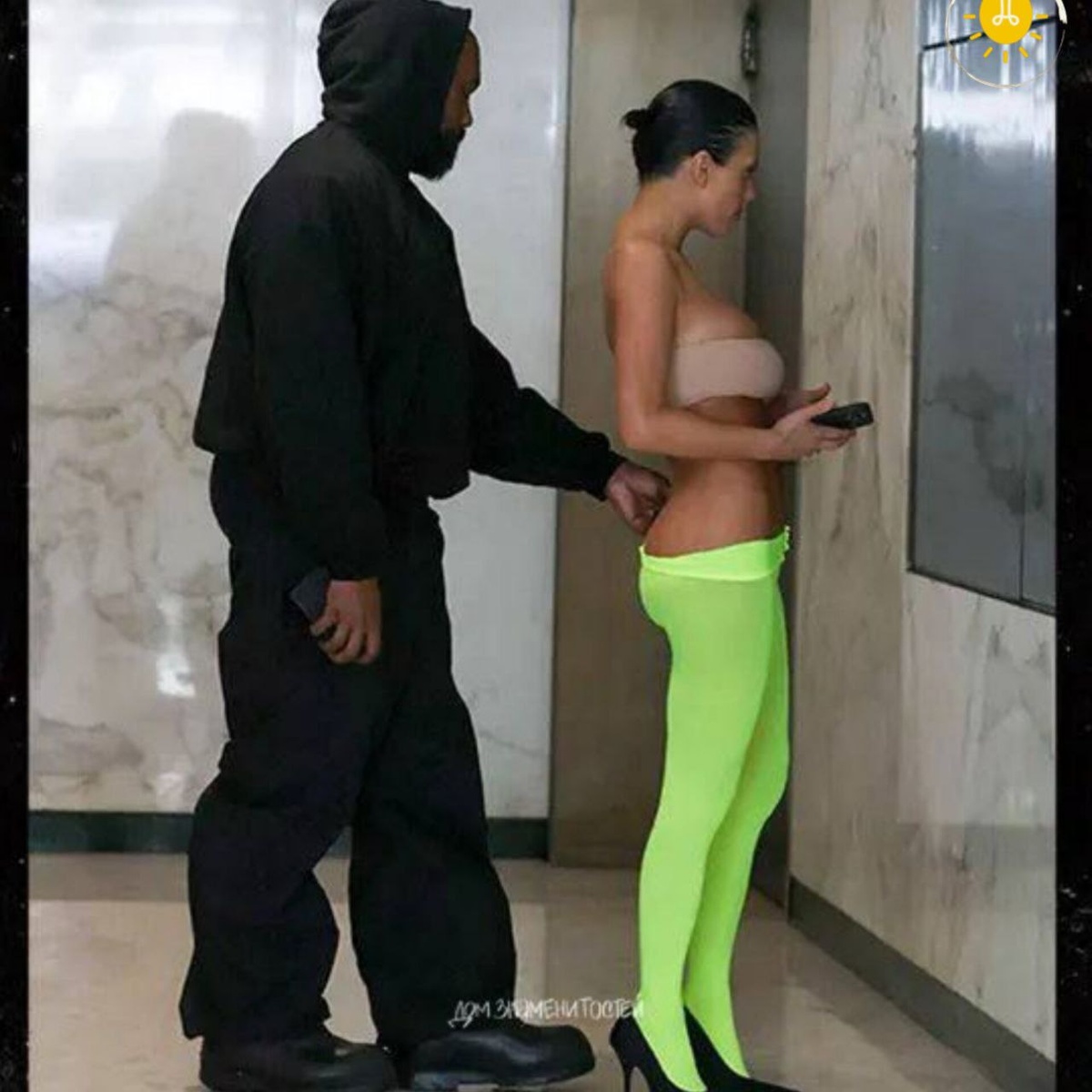 Причем он сам одет с головы до ног