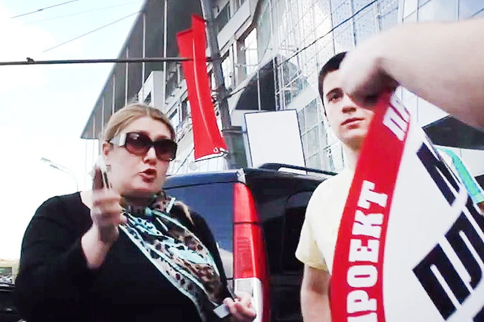 Стоп-кадр с видео скандала на московской парковке. Фото: стоп-кадр с видео "Стопхам"