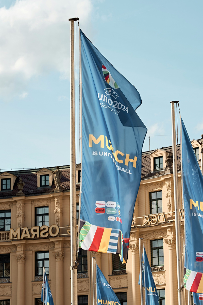 Photo by <a href="https://unsplash.com/@whoisperi?utm_content=creditCopyText&utm_medium=referral&utm_source=unsplash">Peri Stojnic</a> on <a href="https://unsplash.com/photos/a-bunch-of-flags-that-are-in-front-of-a-building-n2Pzgemu788?utm_content=creditCopyText&utm_medium=referral&utm_source=unsplash">Unsplash</a>   