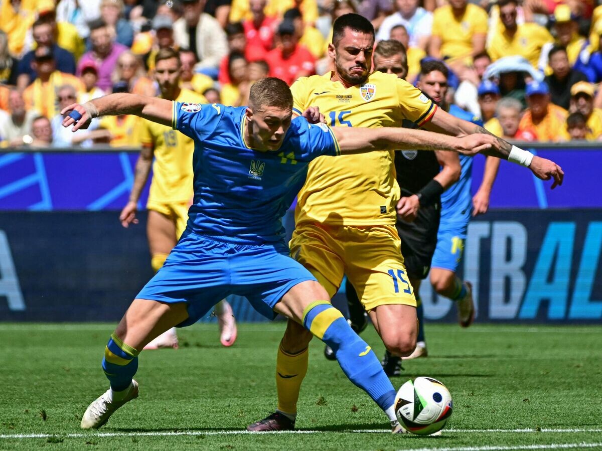    Эпизод матча Румыния - Украина на Евро-2024© AFP 2024 / TOBIAS SCHWARZ