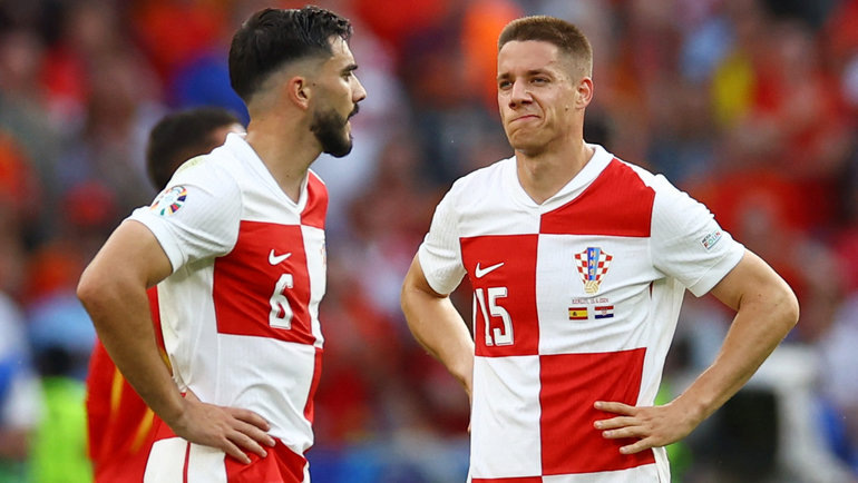    Йосип Шутало (слева) и Марио Пашалич. Reuters