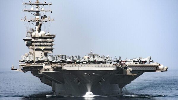    CC BY 2.0 / Official U.S. Navy Page / CVN 69 transits the Strait of Hormuz