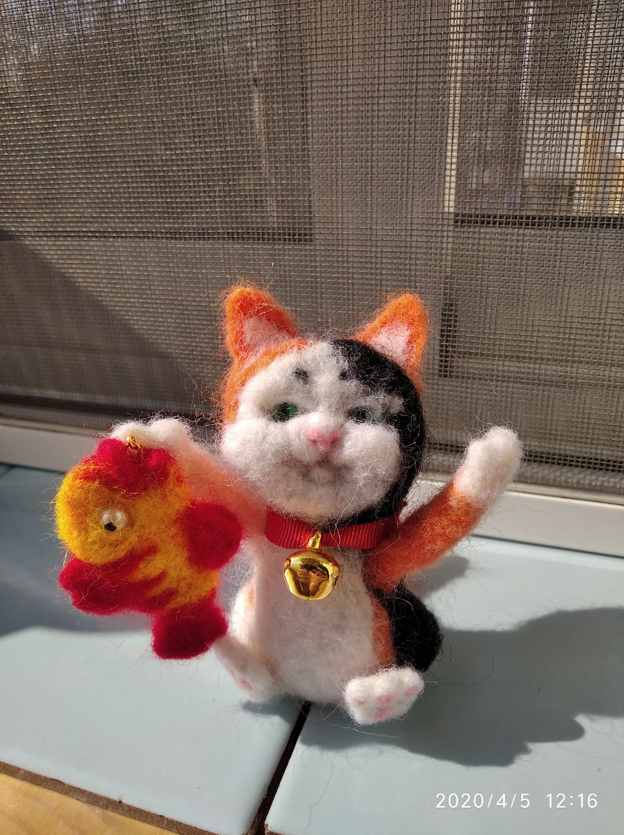 Манеки- неко