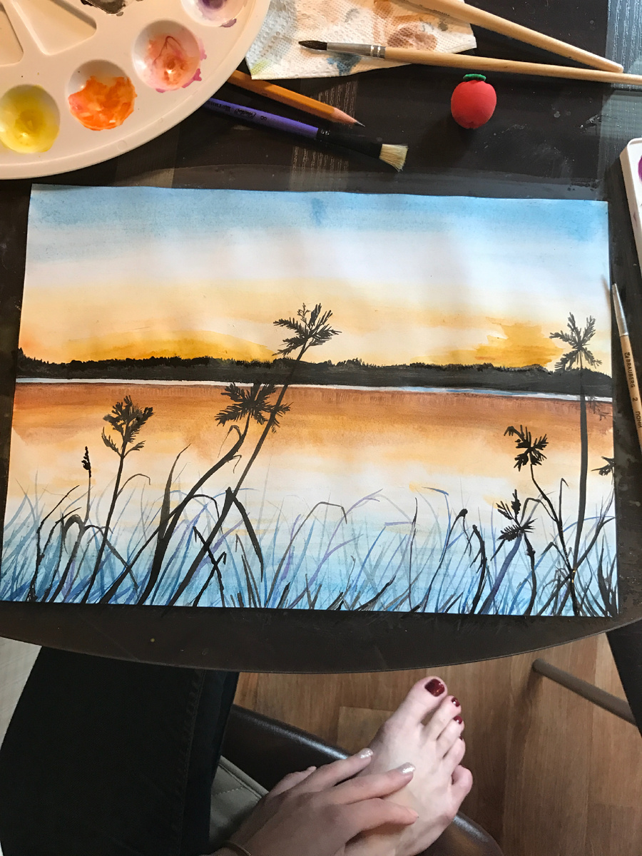 Закат на озере акварелью