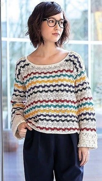 Пуловер из хлопка вязаный крючком из семи разноцветных нитей.