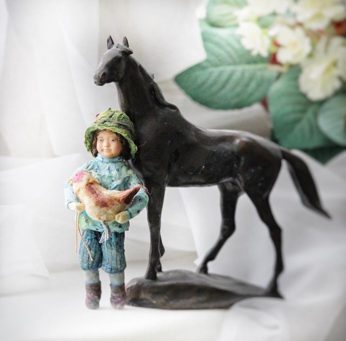 Одна из первых игрушек, которые я сделала. Мальчик с курицей в руках